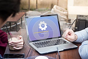 Group of young people having discussion and waiting for installing update process with gearbox percentage progress and loading bar