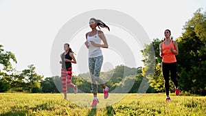 Group of young people having kick boxing training , outdoor