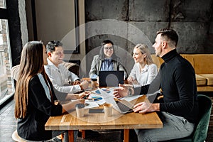 A group of young people in an office
