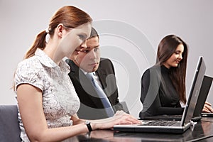 Group of young people in the office working togeth