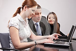 Group of young people in the office working togeth