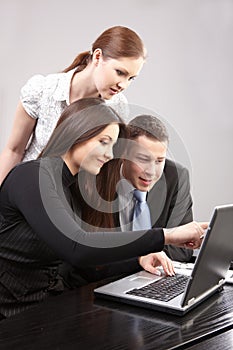 Group of young people in the office working togeth
