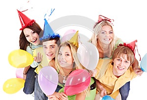 Group of young people in party hat.