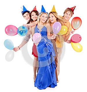 Group of young people in party hat.
