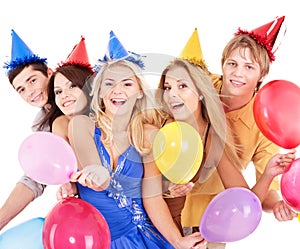 Group of young people in party hat.