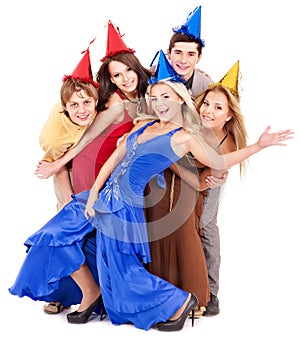 Group of young people in party hat.