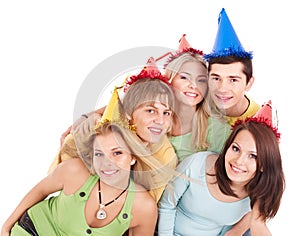 Group of young people in party hat.