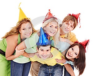 Group of young people in party hat.