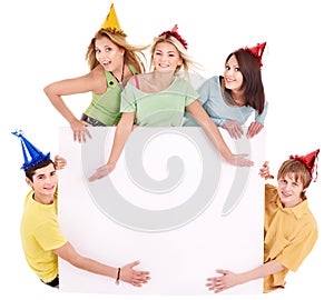 Group of young people in party hat.