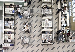 Group of young people sitting at a cafe