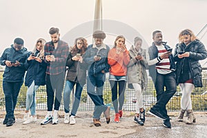 Group of young people staring on their phones