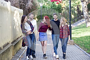 Group of young people together outdoors in urban background