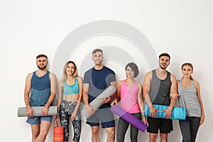 Group of young people waiting for yoga class