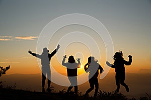 A group of young people who are happy on the hills