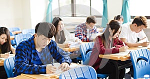 Group of young students in the classroom
