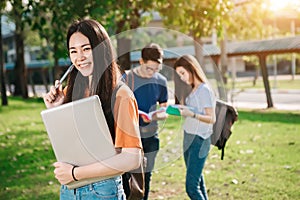 A group of young or teen Asian student in university