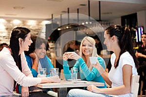 Group of young women on coffee break