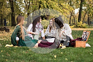 Group of young women outdoors on a picnic