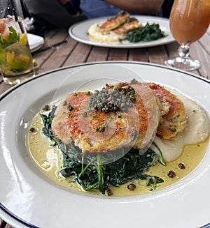 Grouper Piccata with Spinach and Mashed Potatoes.