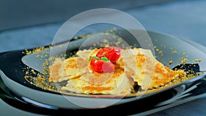 Grouper ravioli with bottarga and cherry tomatoes