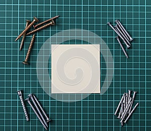 Groups of screws and a stick up note