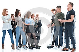 Groups of young men and women standing opposite