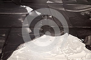 Grouting of light tiles with black grout as background