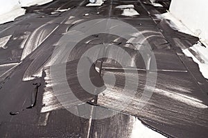 Grouting of light tiles with black grout as background