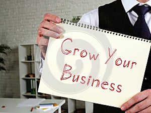 Grow Your Business phrase on the piece of paper