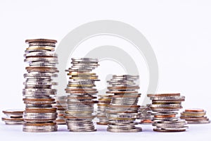 Growing money graph on a row of coin and pile of bath coins stack on white background finance business isolated