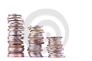 Growing money graph on a row of coin on white background finance business isolated