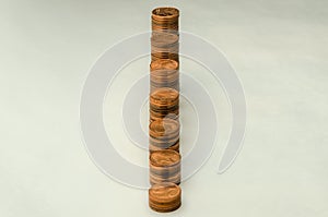 Growing mountain of coins in denomination of two euro cents on white background