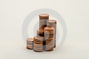 Growing mountain of coins in denomination of two euro cents on white background