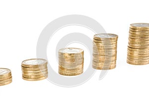 Growing one euro coin stack isolated on white background