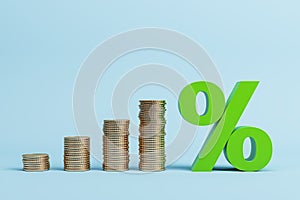 Growing stacked golden coins and green interest rates on blue background. Financial business concept, banking and investment with