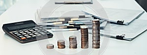 Growth coin stack symbolizing business investment. Shrewd