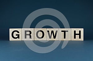 Growth. Cubes form the word Growth