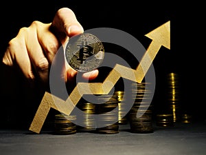 Growth up of Bitcoin btc price. Arrow and coin. Crypto trading photo