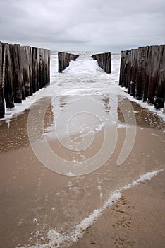 Groyne at the beach photo