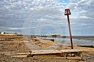 Groynes and post on Worthing beach photo