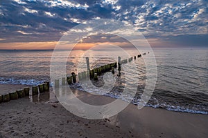 Groynes on shore of the Baltic Sea in Graal Mueritz, Germany