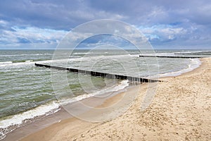 Groynes on shore of the Baltic Sea in Graal Mueritz, Germany