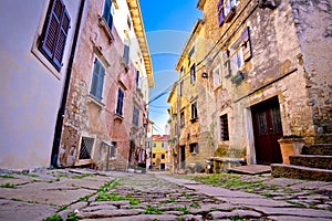 Groznjan cobbled street and old architecture view