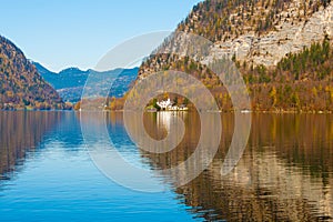 Grub castle Schloss Grub on the Hallstattersee lake. Alpine mountain landscape