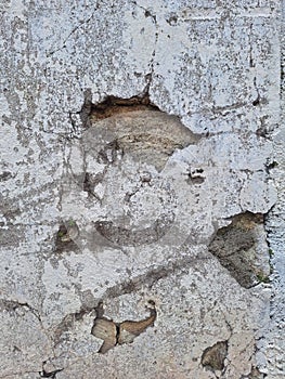 Grudge Cracked Cement wall with big hole in the middle