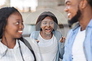 Grumpy black girl angry to her boyfriend flirting with another woman