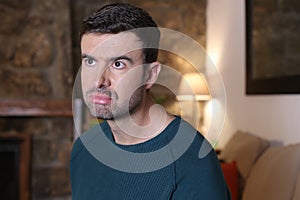 Grumpy looking man showing funny expression