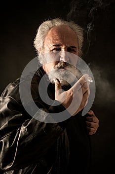 Grumpy man with cigarette