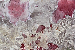 Grunge aged weathered cement pink red wall