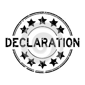 Grunge black declaration word round rubber stamp on white background
